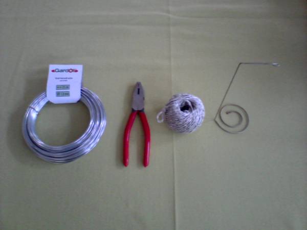Tools and materials used to build an DIY lifter from a thick wire