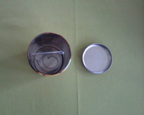 New coffee pad tin with the DIY lifter in action (empty tin)
